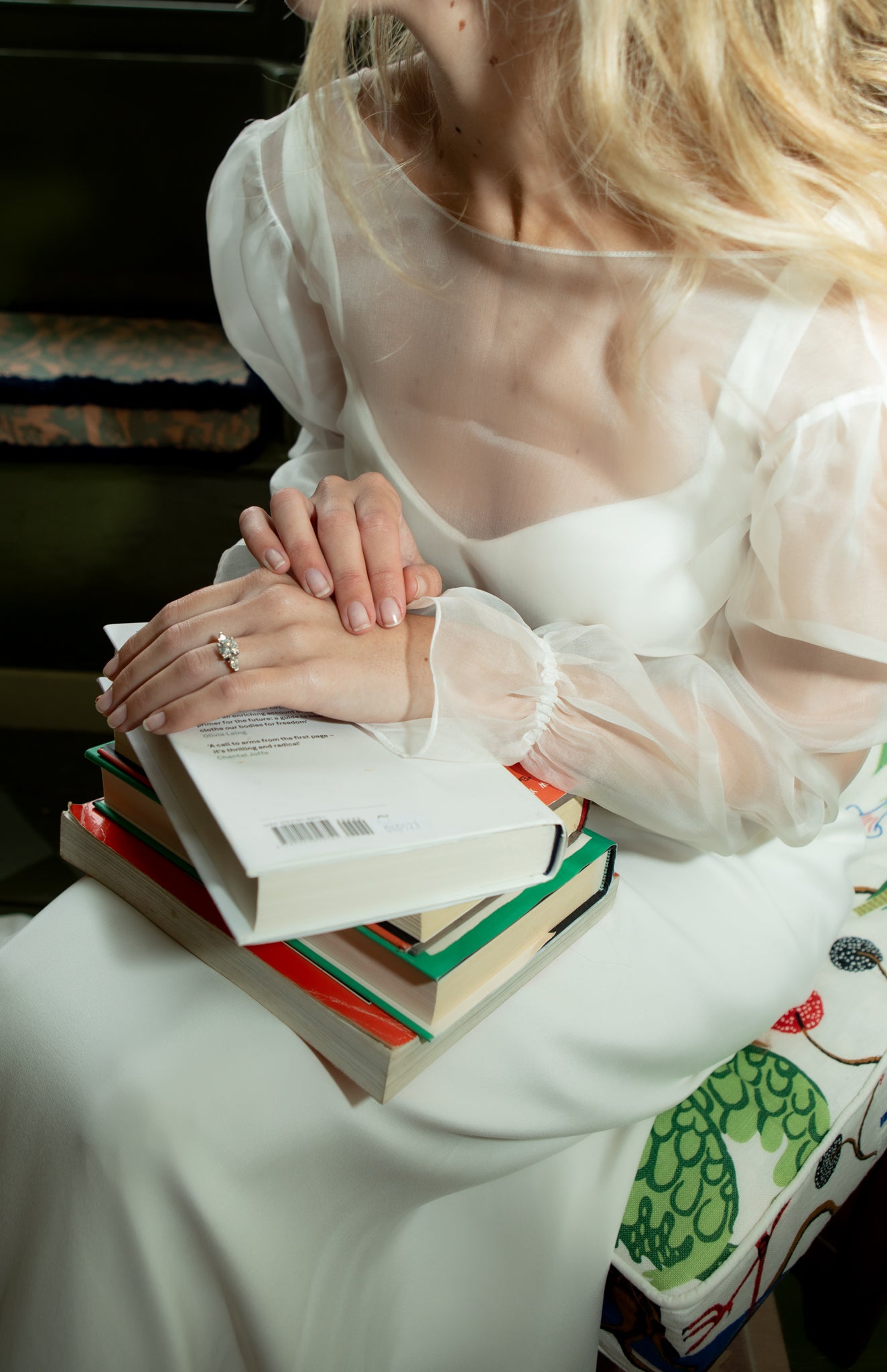 Engagement Ring worn by bride in wedding dress