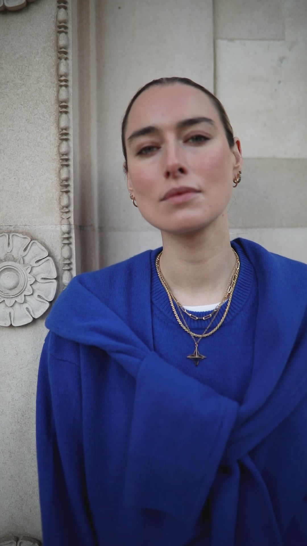 Video of Flora Macdonald Johnston wearing a royal blue jumper and our Gold Vermeil Theodora Pendant amongst other Antonia Guise Jewellery