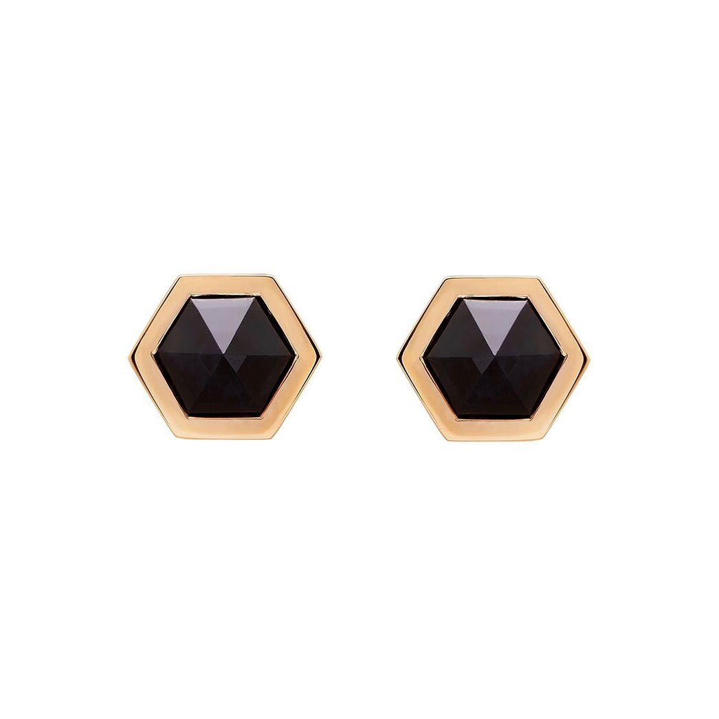 Godiva hexagon studs face on one a white background