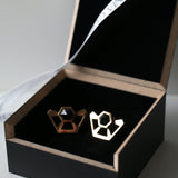 Delilah halo earrings with black spinel  sat in black presentation box with Antonia Guise ribbon