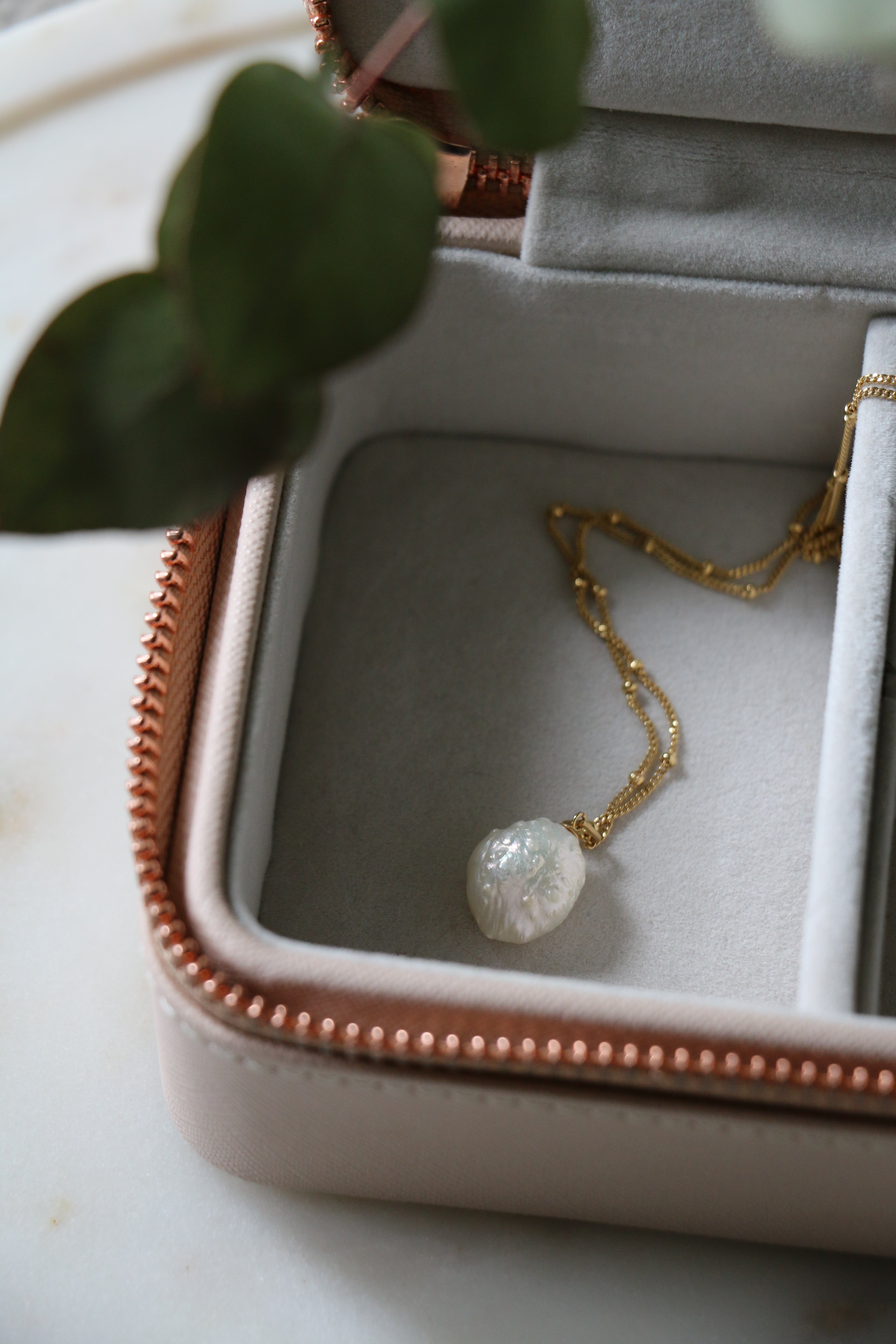Anna Pearl Pendant on constellation chain in a pink jewellery box