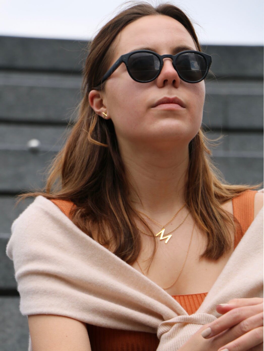 Model wearing M Gold Necklace and sunglasses