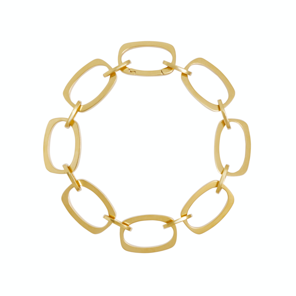 Nancy Chain gold bracelet lying flat on white background