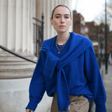Image of model looking to camera wearing our Jenny Trace Chain, handmade in England