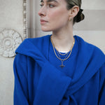 Image of model wearing a stack of Antonia Guise Gold Vermeil Necklaces, including our Jenny Trace Chain