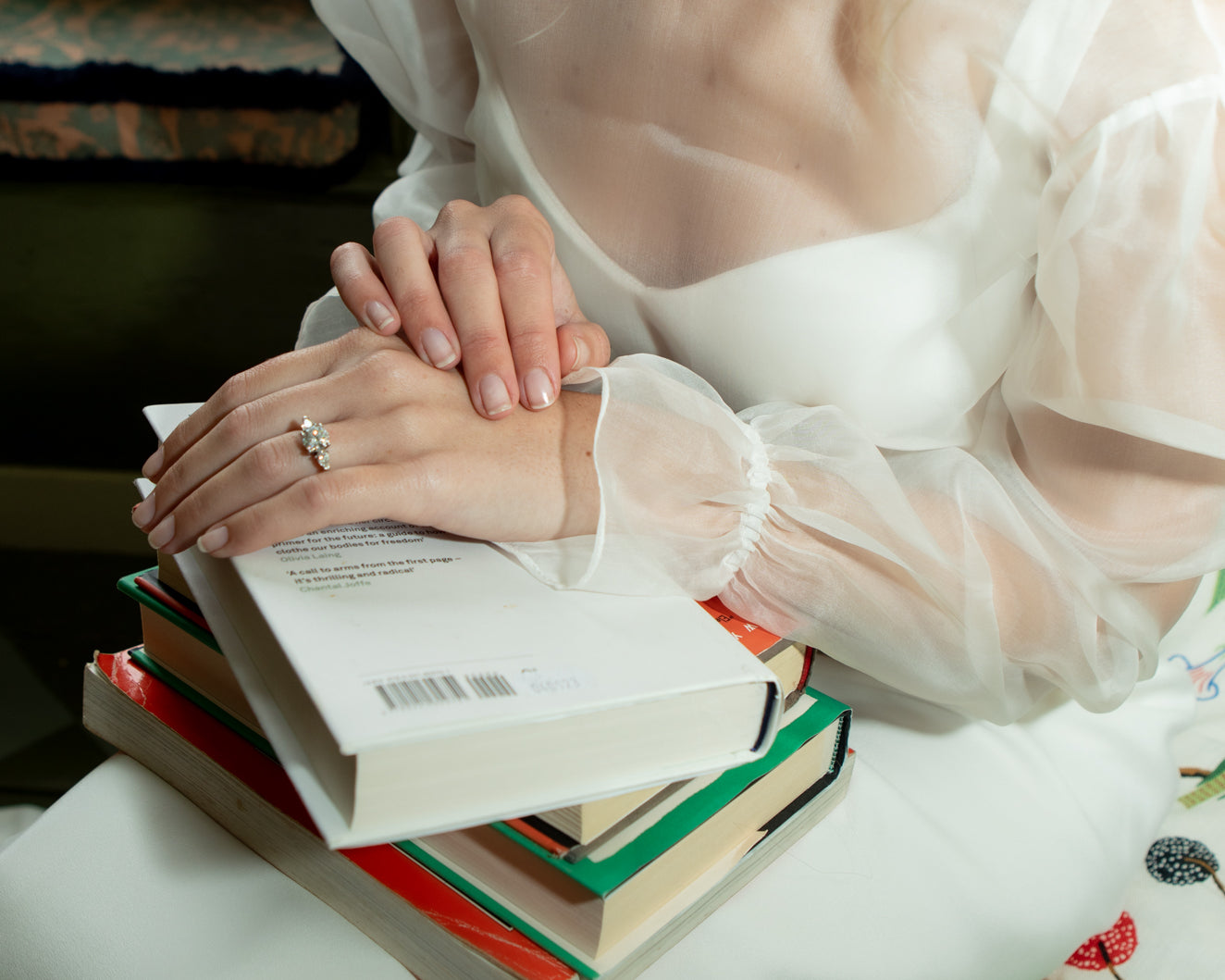 Engagement Ring worn by bride in wedding dress
