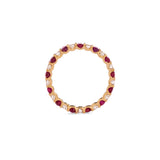 Image of oval Pink Ruby and round Diamond eternity band set in yellow gold in profile on a white background