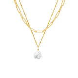 Anna pearl drop pendant and trace chain necklace on white background