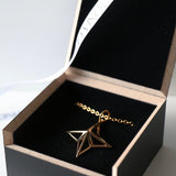 Our Theodora Necklace laid out in our recycled wooden presentation box